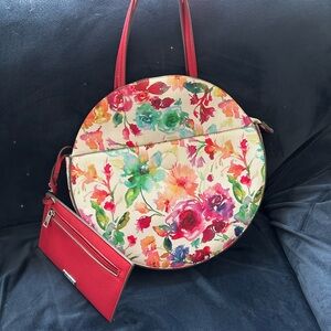 JULY SALE!!! Carlos Santana Handbag with coordinating change purse. Like new.